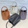 New woven bucket bag leather women's fashion portable messenger bag child and mother bag niche design portable