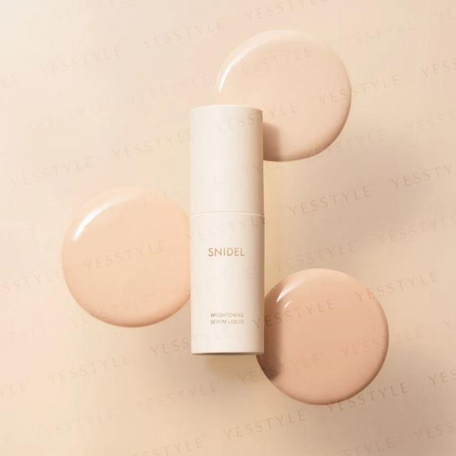 Snidel Beauty - Осветляющая сыворотка-тональная основа SPF 30 PA+++ 00 Illuminating Lavender