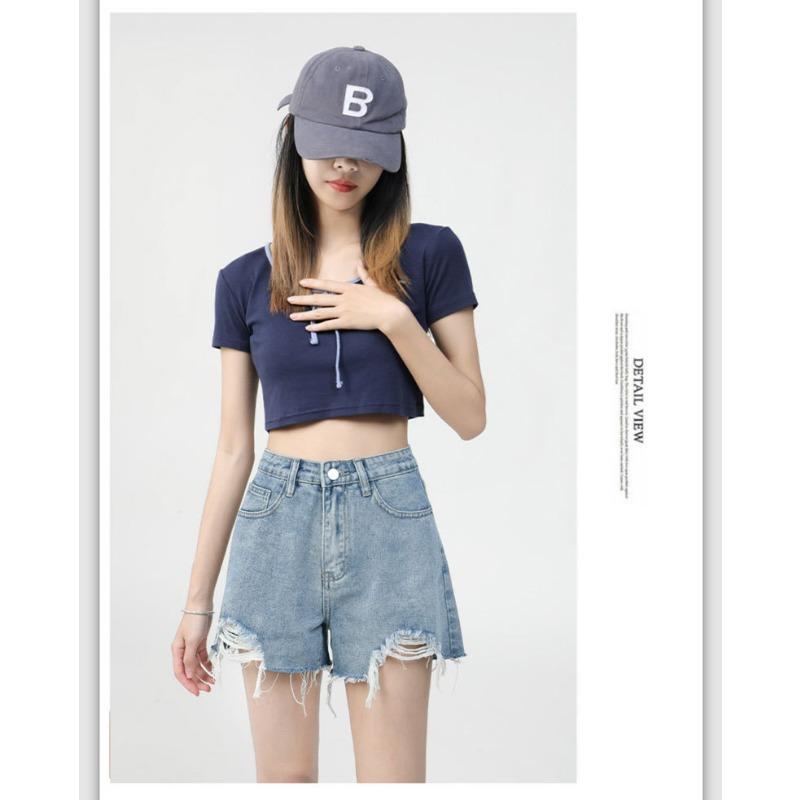 Pantaloncini di jeans casual strappati e versatili da donna alla moda a vita alta da celebrità di Internet con bordo grezzo gamba larga Hot Pants
