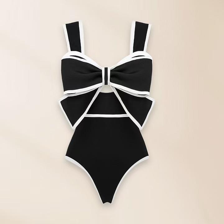 Südostasiatischer Retro-Jumpsuit mit Schleife: Bauchbedeckender, Schlankmachender Badeanzug mit Rock-Stil für den Strand.