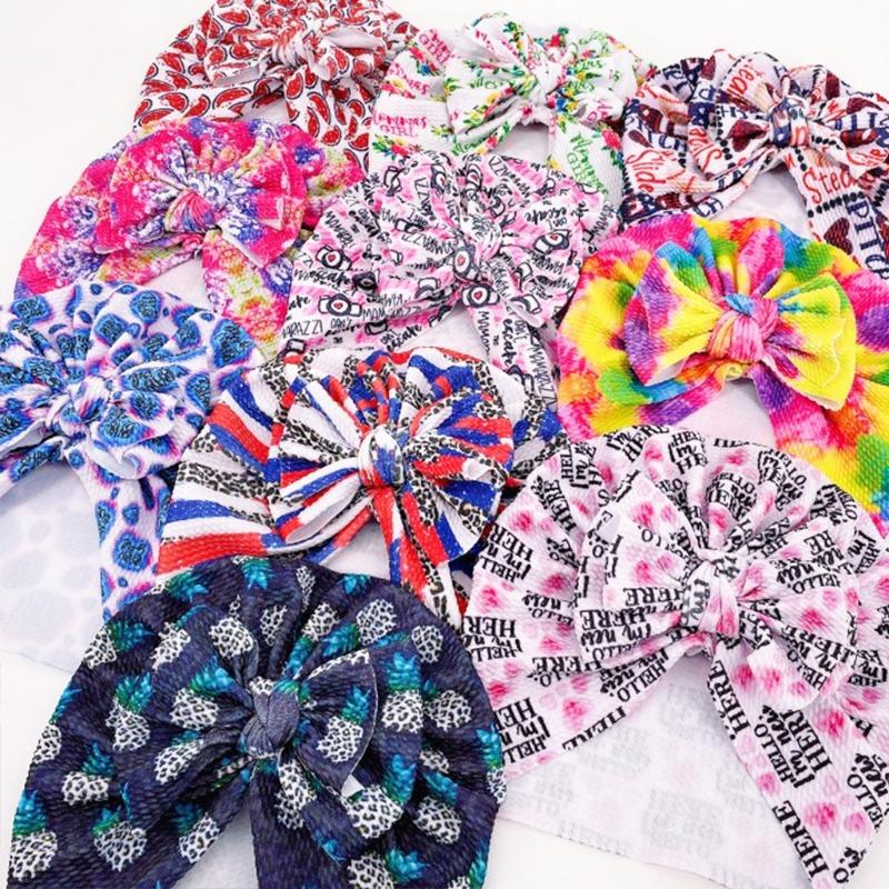 Neue Kinder-Knotenmütze, niedliche kreative bedruckte gerippte Schleifenmütze, Baby-Schlupfmütze