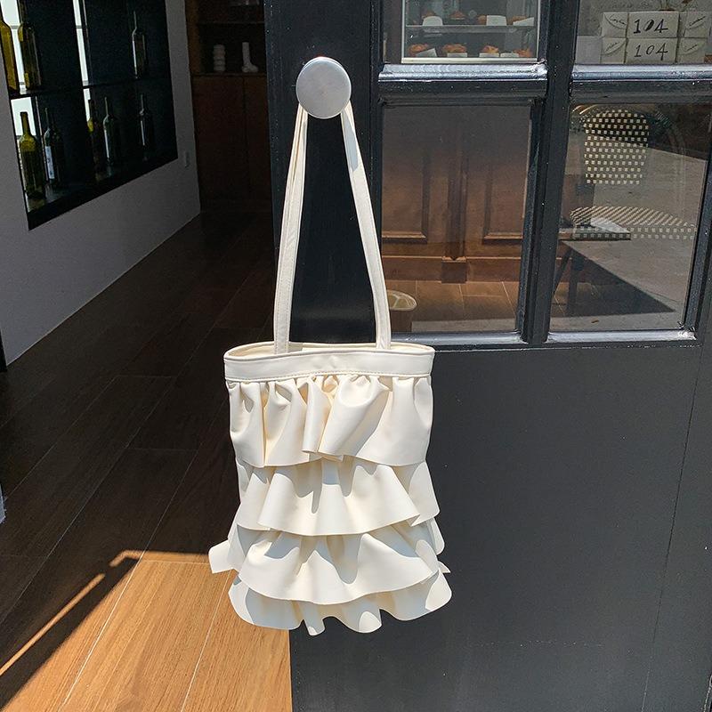 Vår och sommar personlig tygkasse stor kapacitet axelväska dam nisch lotusblad spets veckad armhåleväska hög känsla