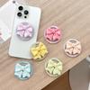 Magnetic Retractable Bow Phone Holder: Airbag Back Sticker & Desktop Stand