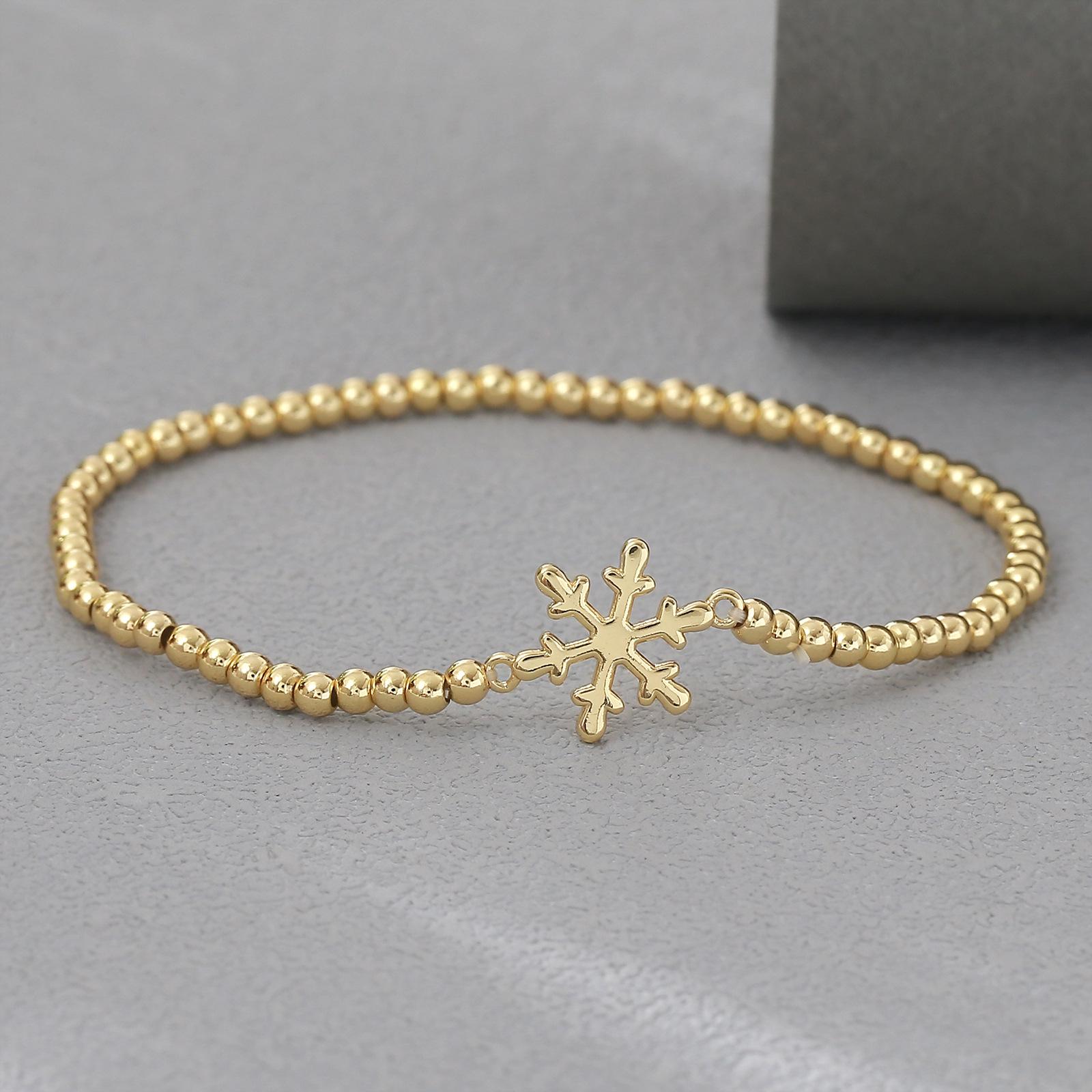 Gold-Plated Christmas Charm Bracelet with Tree, Snowman, and Reindeer Beads