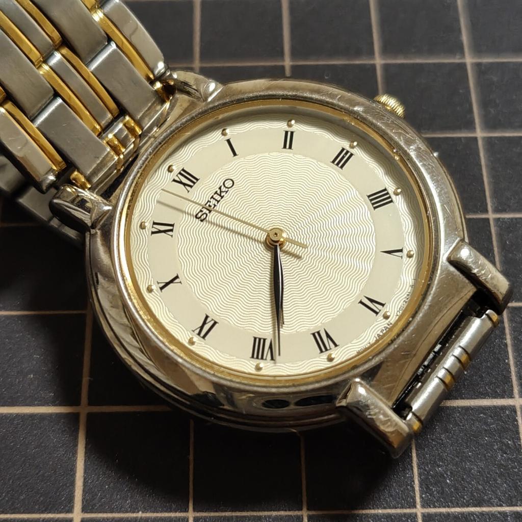 SEIKO Quartz Roman Numeral Wristwatch with New Management K26e [Working Condition] V701-1771 Battery. Code