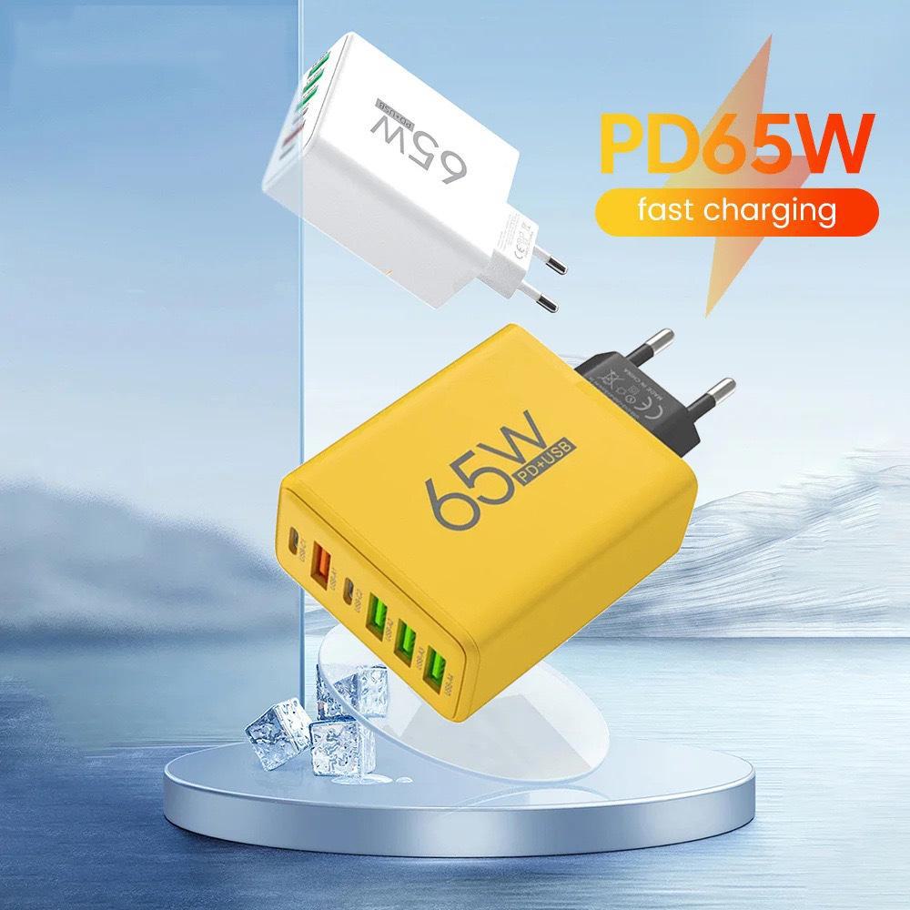 "Caricabatterie Rapido PD65W con 4 Porte USB e 2 Porte Type-C, Compatibile con Telefoni Apple e Huawei."