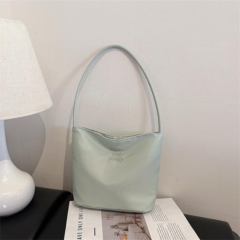 Корея Much Ebong2024 Женская универсальная нейлоновая сумка-ведро - Простой и повседневный дизайн