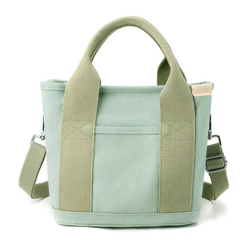 Canvas bag Portable messenger bento bag Large capacity bag Fashion trend One shoulder messenger women's bag