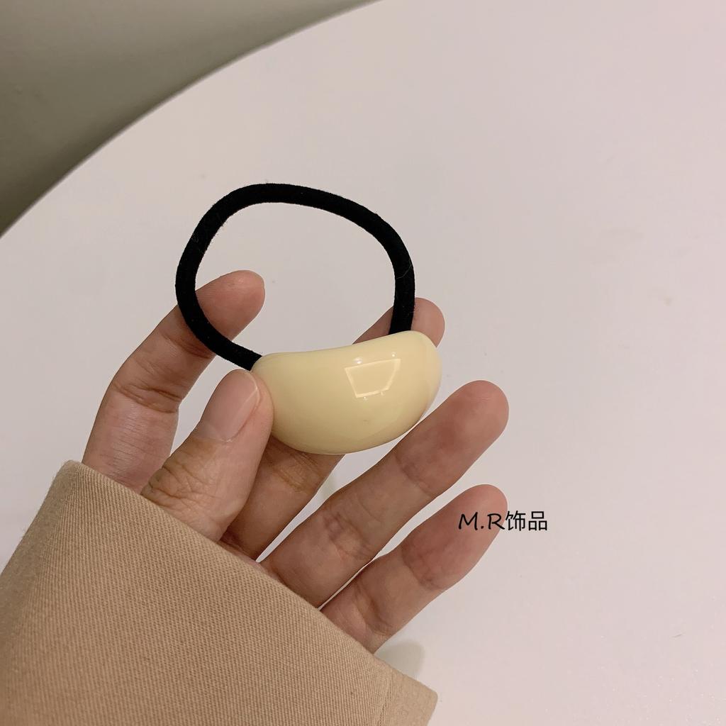 Ein schlichter und eleganter, kalter Stil Acryl-Bogenförmiger Lederband-Kopfschmuck für Damen