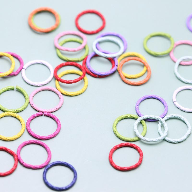 DIY Jewelry Accessories: Colored Baking Paint Embossed Rings (2,000/pack), featuring Round, Open, Single, and Twisted Flower Designs.