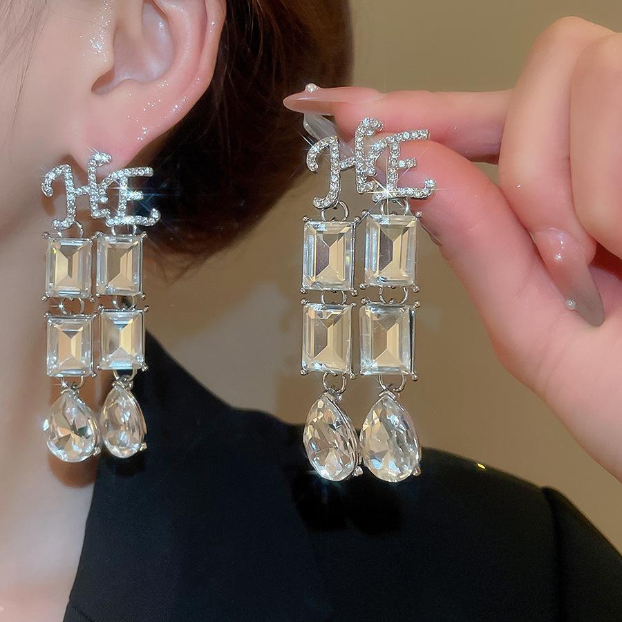 Silver Needle Water Drop Tassel Earrings - Light Luxury High-End Design for Women's Fashion.