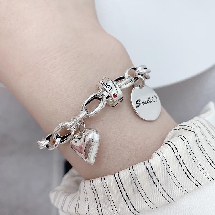 Japanese-Korean Niche Love Heart Bracelet for Women: S925 Silver-Plated Simple Letter Round Tag Bangle, Trendy Student Jewelry.