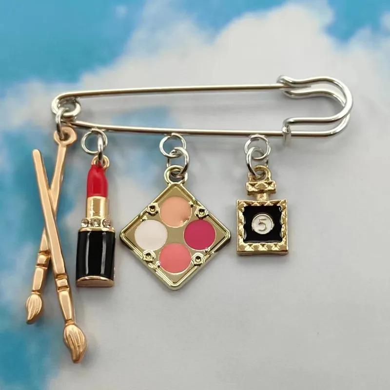 Lipstick Perfume Eyeshadow Palette with Makeup Brushes and DIY Artist Brooch.