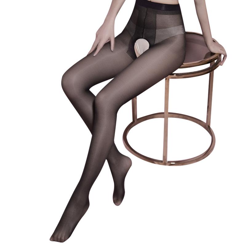 Verführerische schwarze Seidenstrümpfe ohne Schrittnaht mit Ölglanz