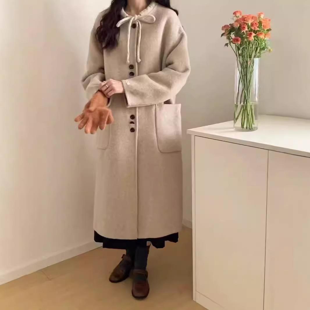 

Новое осенне-зимнее двухстороннее кашемировое пальто, корейский стиль, модное длинное шерстяное пальто с круглым вырезом и шнуровкой для женщин M