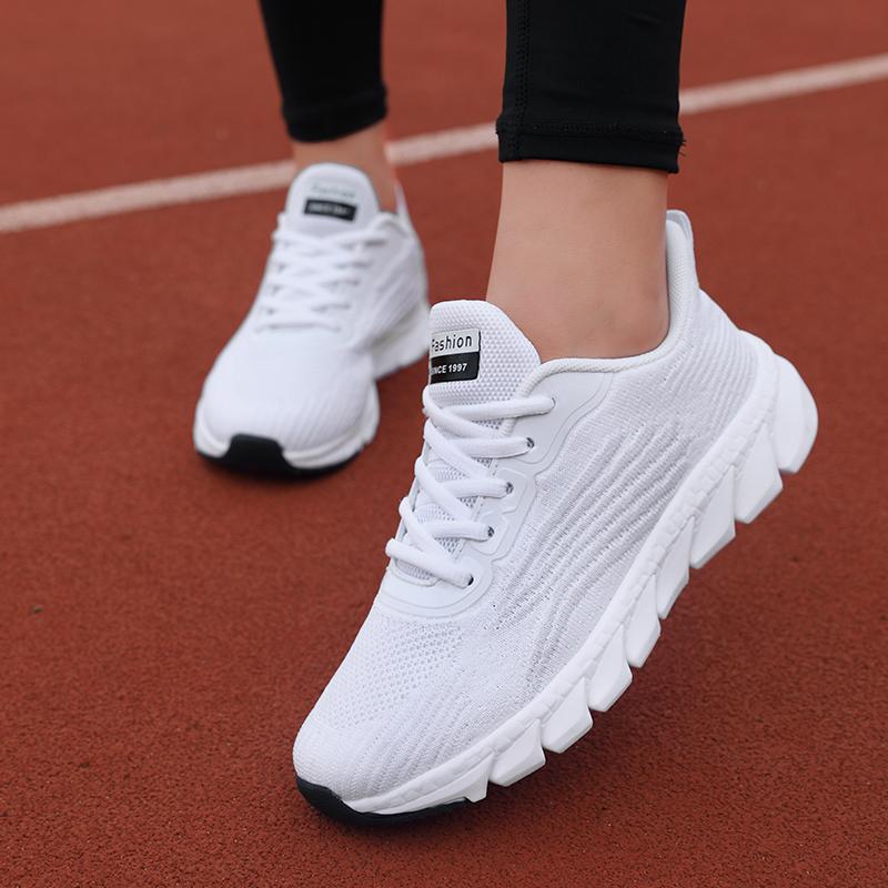 Fashion Spring Flying Knitted Breathable Running Shoes Sports Women Casual Shoes Soft Sole Couples Men And Women Small White Shoes