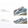1906R New Spruce Unisex Sneakers Creme Metallic-Blaugrün M1906RRC