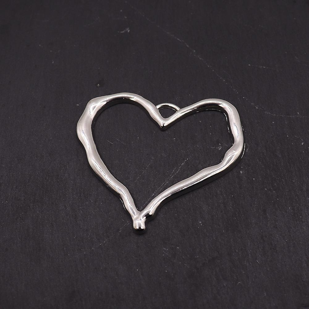 Cross-Border Love Pendant: Alloy Hollow Heart-Shaped DIY Jewelry and Earring Accessories