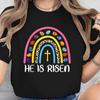 Women's He Is Easter T-Shirt - Black Tee with Colorful Rainbow and Cross Design, Casual Crew Neck, Short Sleeve, Hine Wa