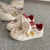 Guochao niche bow graffiti printing little white shoes women's spring and autumn new versatile casual board shoes women