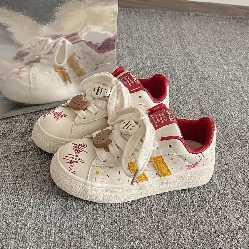 Guochao niche bow graffiti printing little white shoes women's spring and autumn new versatile casual board shoes women