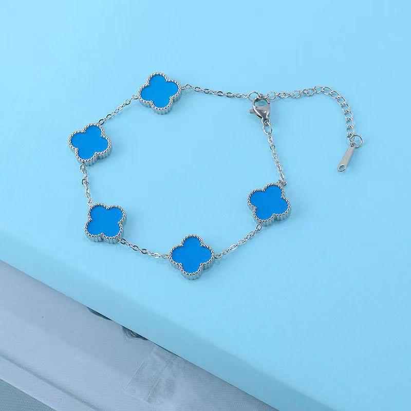 Bracelet trèfle à quatre feuilles avec acier titane double face qui ne se décolore pas et bracelet tendance à cinq fleurs, simple et polyvalent