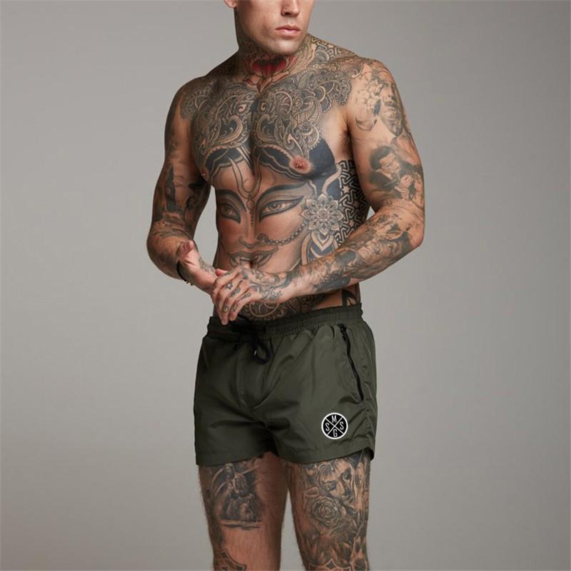 Muscleguys Workout Street Wear Mens Loose Running Shorts Running Hiking Short Jogger Pants