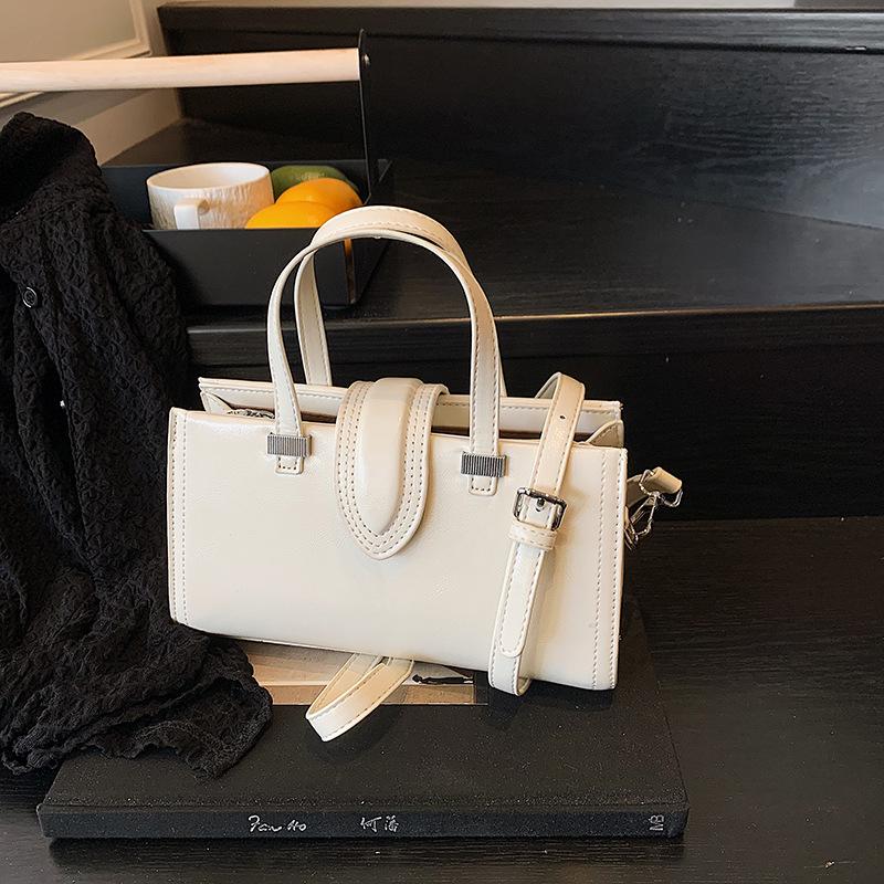 

Экспортный нишевый дизайн полуручная сумка-подушка Douyin прямая трансляция модная сумка-мессенджер на плечо для通勤 женская сумка белый