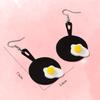 Pair of black pan fried eggs earrings earrings cartoon creative plane cute and sweet