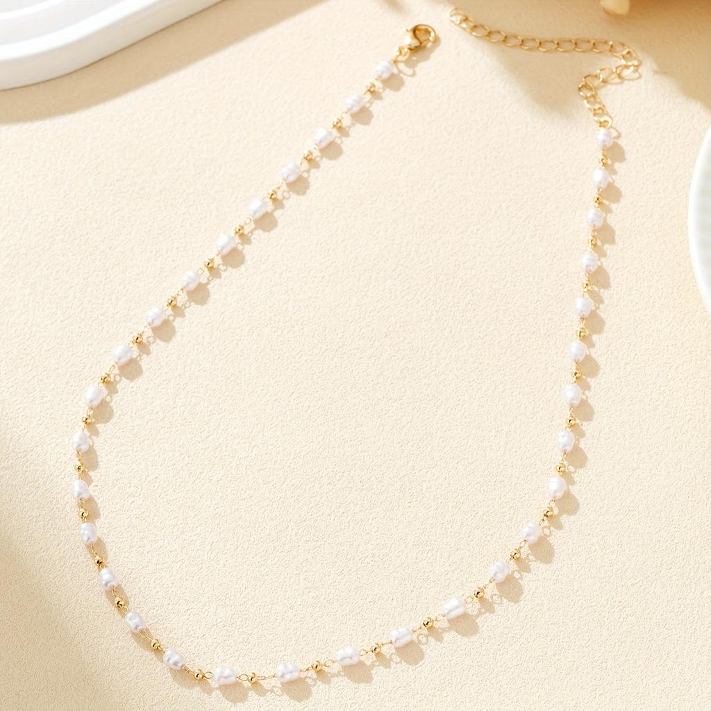 A High-end Rice-grain Shaped Pearl Chain Short Necklace, an Elegant and Stylish Clavicle Chain, Suitable for Women To Wear Every Day.