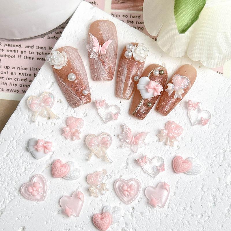 50Pcs Pink Series Bow Heart Resin Nail Charms 3D Luminous Double Butterfly Peach Heart Sweet Wind Nail Art Decorations DIY Nails