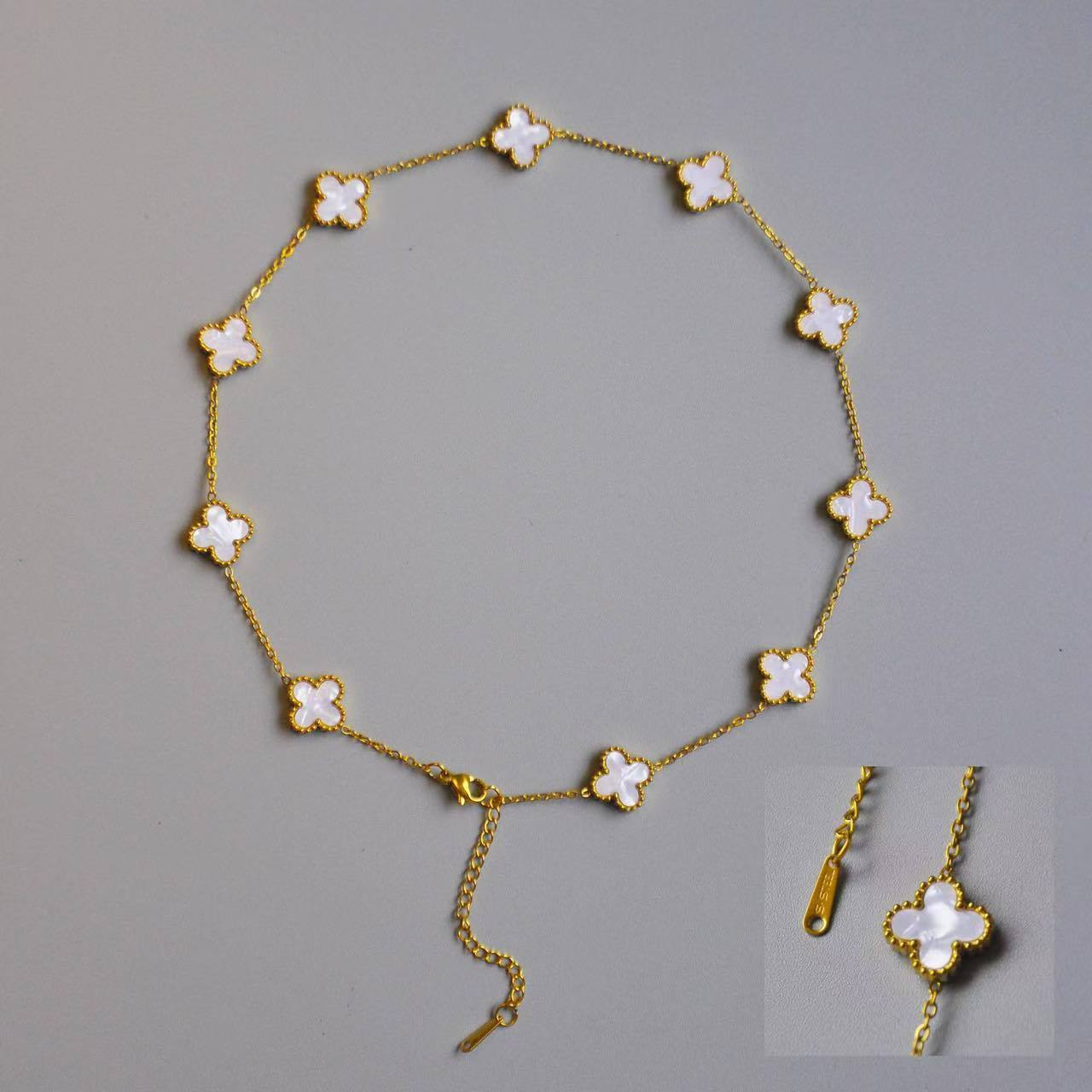 

Титанова сталь 10 Квітів Чотирилисник Намисто 18k50см Довге Легка розкіш Сотня Відповідне Намисто Жіноче Високоякісне Намисто 18K