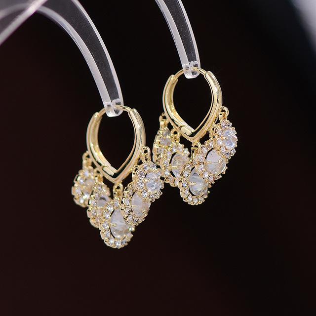 

Корейская модная бижутерия 14-каратное настоящее золотое покрытие роскошные круглые циркониевые серьги-кисточки элегантные женские серьги для свадебной вечеринки белый