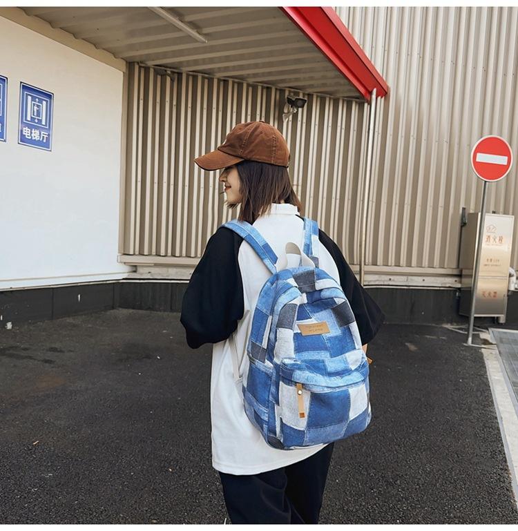 Large-capacity new middle school schoolbag, junior high school backpack, boys' casual versatile college student computer bag, women