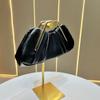 A Fashionable Women's Pleated Handbag, A Niche Pleated Clutch Bag, and A Dinner Bag