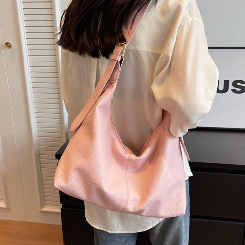 

Однотонна сумка через плече великої місткості. Жіноча жіноча сумка через плече з м’якої шкіри. білий