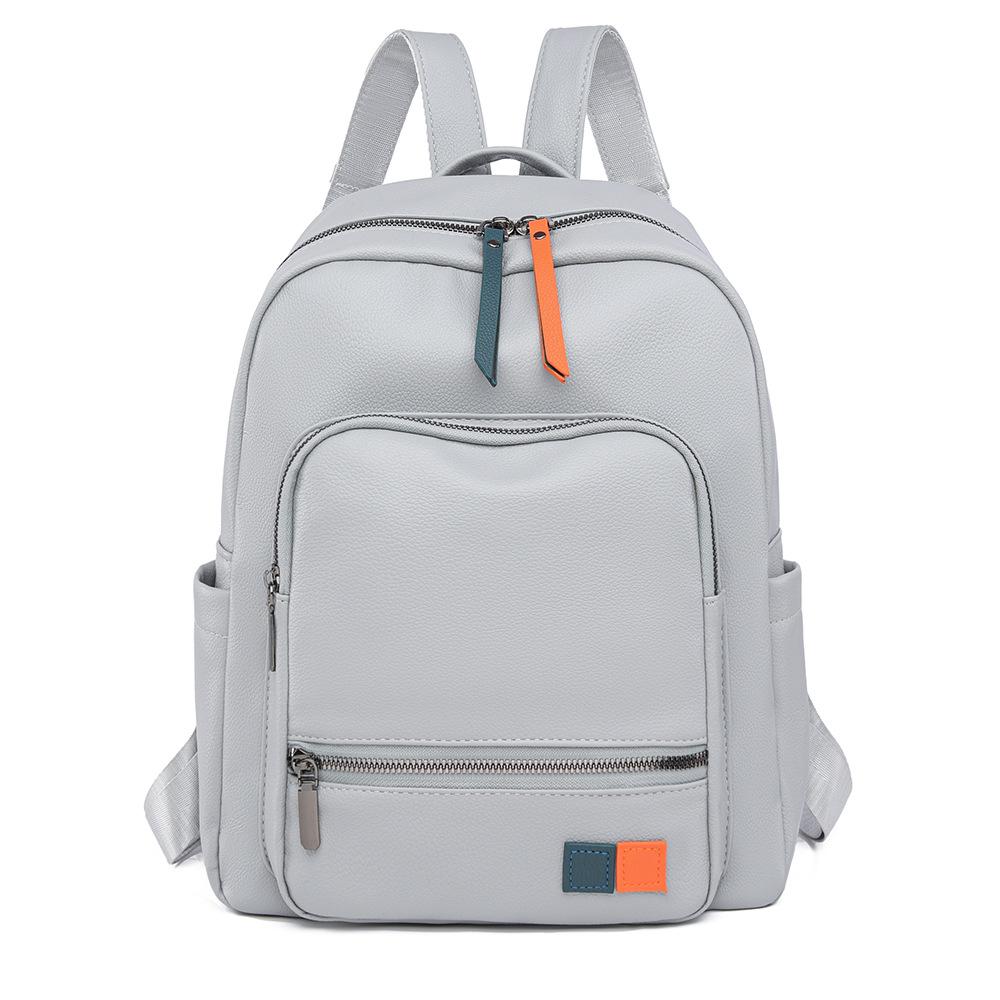 Fashion retro simple backpack new versatile leisure travel backpack soft leather niche commuter college student schoolbag