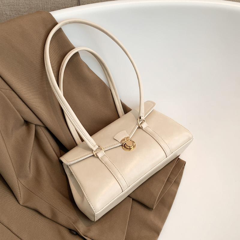 Textured niche bag women's new autumn and winter fashion handbag retro commuter high-end single shoulder armpit bag