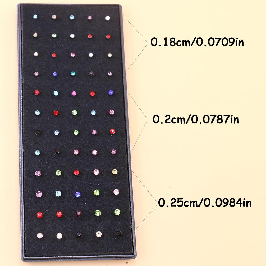 Kolczyki do nosa ze stali nierdzewnej z cyrkoniami 2 mm, opakowanie 60 szt.