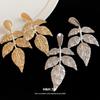 European and American Silver Needle Metal Pleated Leaf Pendant Earrings Fashionable Simple Stud Earrings Light Luxury High-end Earrings Women