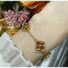 Pulsera de trébol de cuatro hojas para mujer, estilo palacio retro, lujo accesible, moda elegante.
