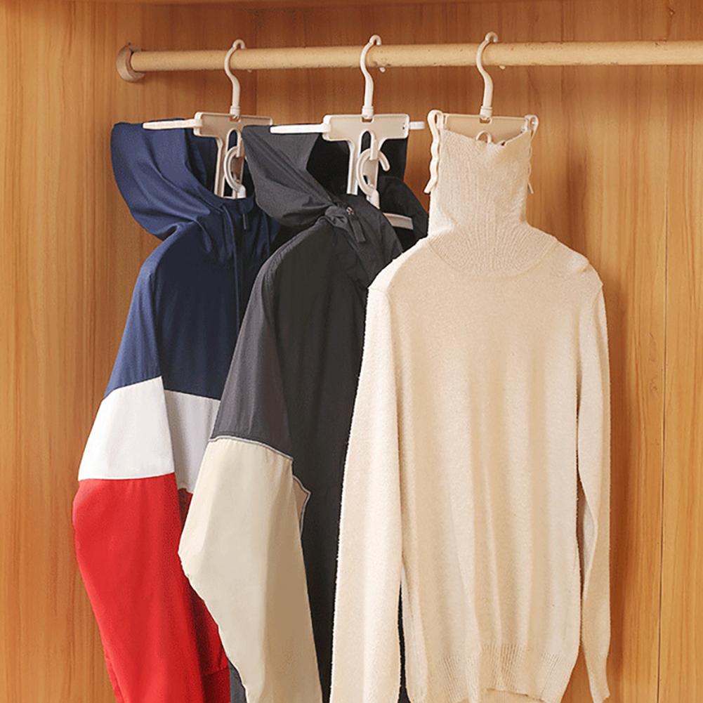 folding sweater on hanger