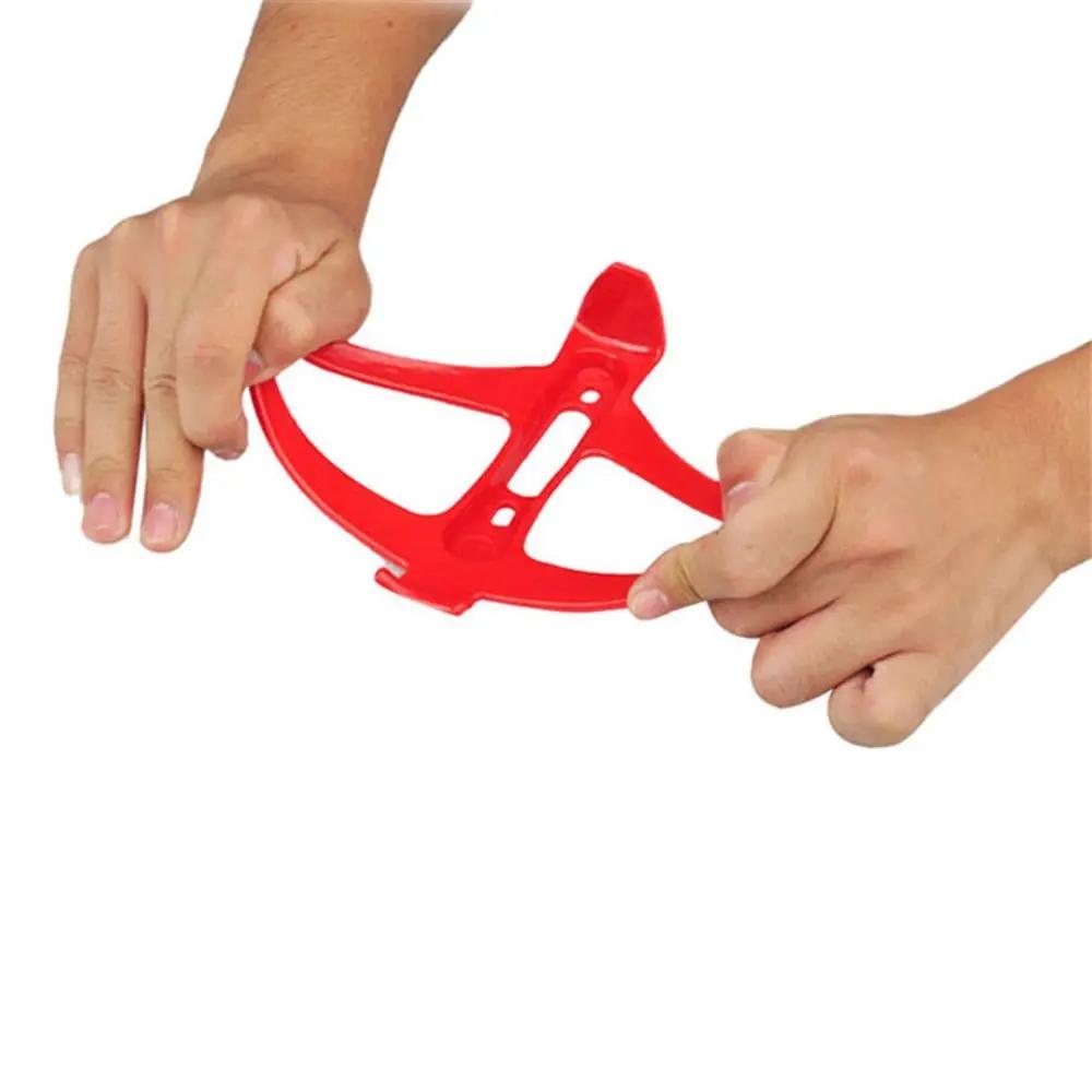 Plastikowe górskie drogi o wysokiej wytrzymałości Klatki na butelki rowerowe Akcesoria rowerowe Rower Regulowany stojak Uchwyt na butelkę z wodą