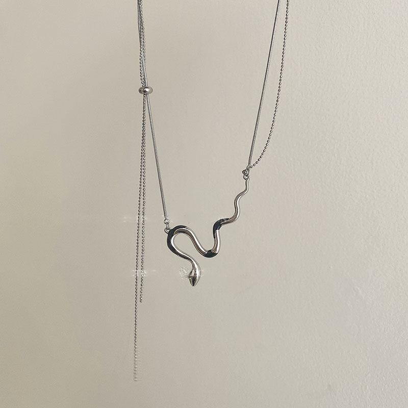 Windperlenkette Damen vielseitig Nischen-Design High-End leichter Luxus Schlüsselbein-Kette Liebesanhänger Schmuck
