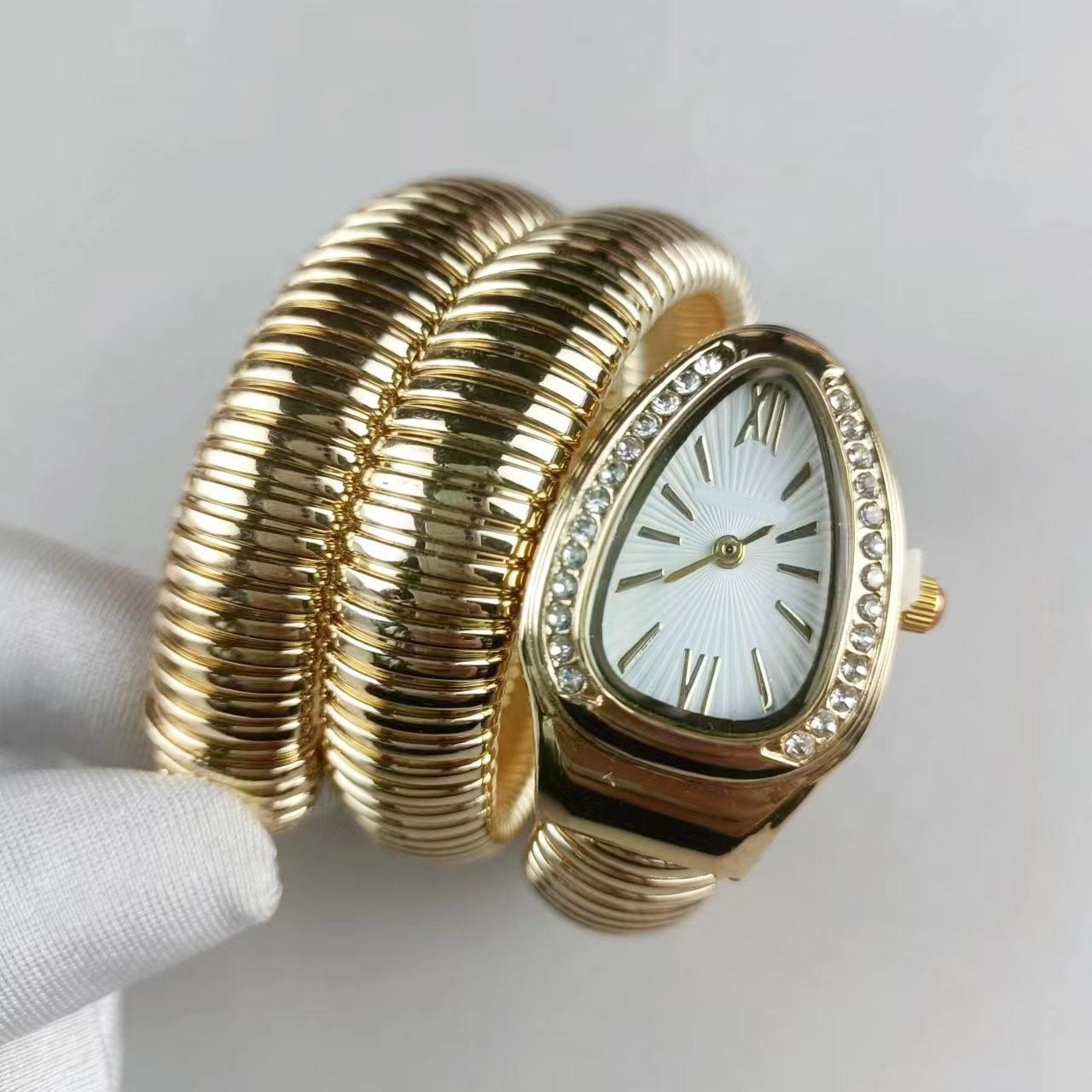 Fashion creative snake two circles steel belt steel belt watch women s personality full diamond quartz watch manufacturer