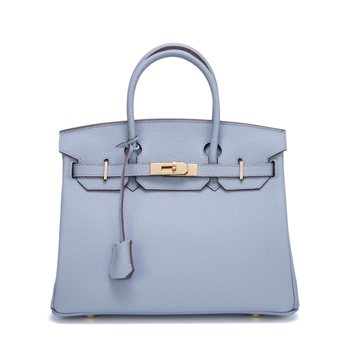 

Новая женская сумка Togo из коровьей кожи с мелкозернистой золотой пряжкой и платиновым покрытием для носка, большая вместимость, женская сумка 25x10x19cm светло-синий