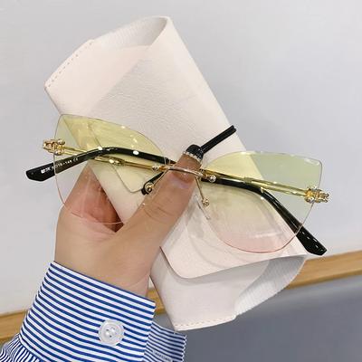 Bezramkowe luksusowe modne okulary przeciwsłoneczne letnie okulary przeciwsłoneczne z wyciętymi krawędziami owalne designerskie odcienie damskie okulary przeciwsłoneczne Uv400