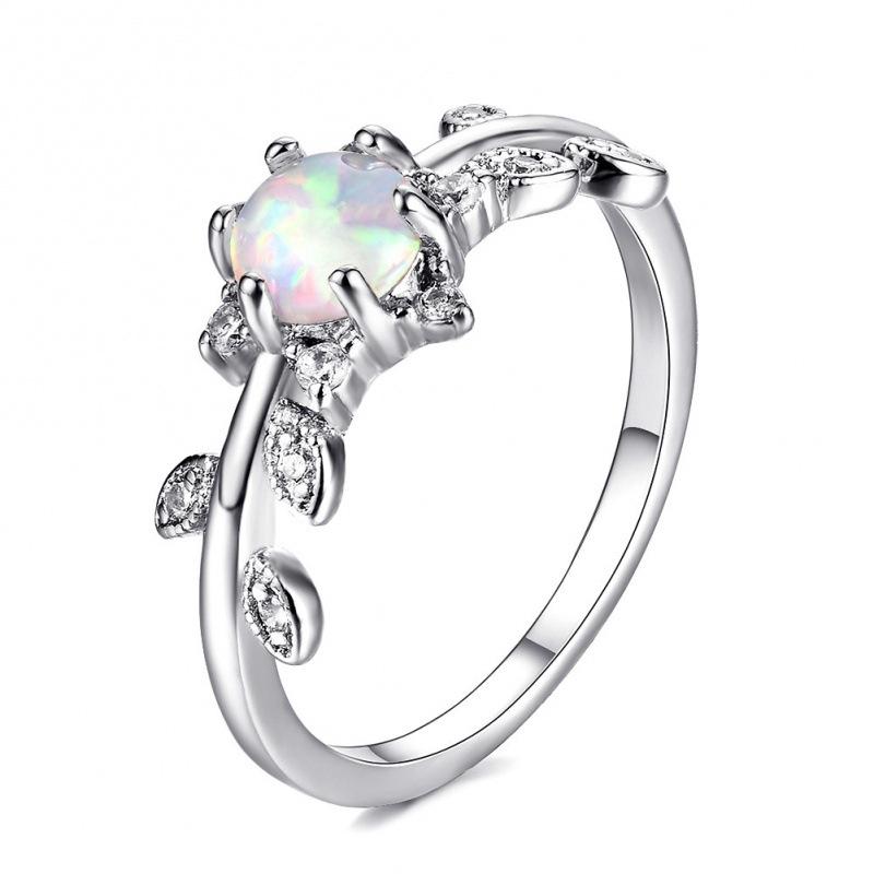 

Blue ring in white gold with small diamonds no. 8 белый