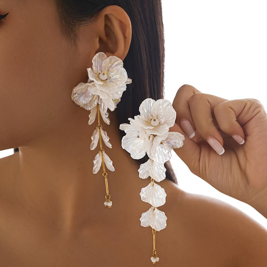 A pair of women's long earrings in bohemian style, made of acrylic with iridescent shells, flowers, and crystals, suitable as a holiday gift