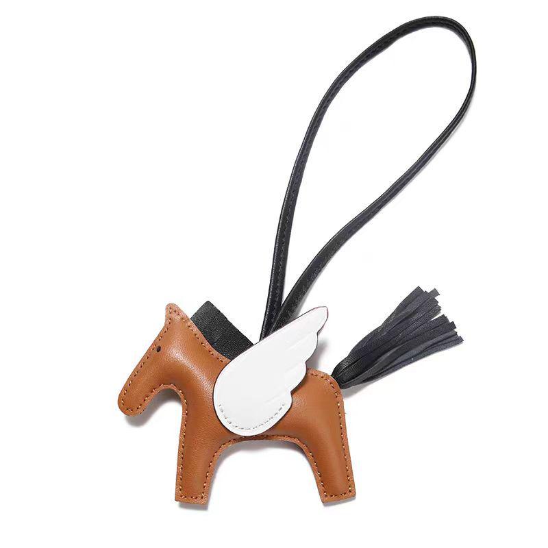 Håndsømmet Ekte Skinn Pony Veskeanheng - Søtt Lammeskinn Flygende Hest Design